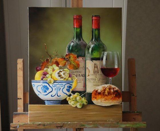 Still life with wine bottle and bowl of fruit