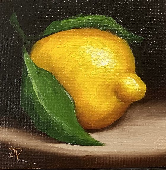 Little leafy lemon still life