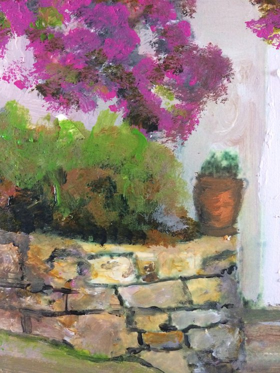 Mediterranean House with Pink Flowers