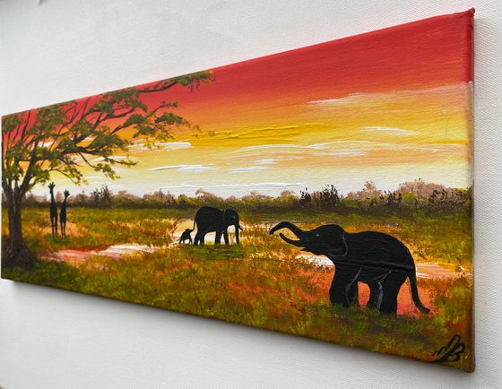 Elephants and Giraffes in the Savannah