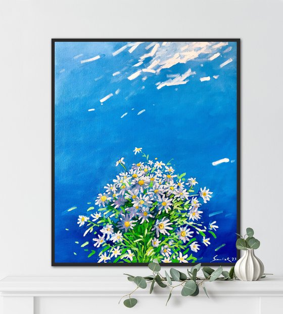 Blue sky with white flowers