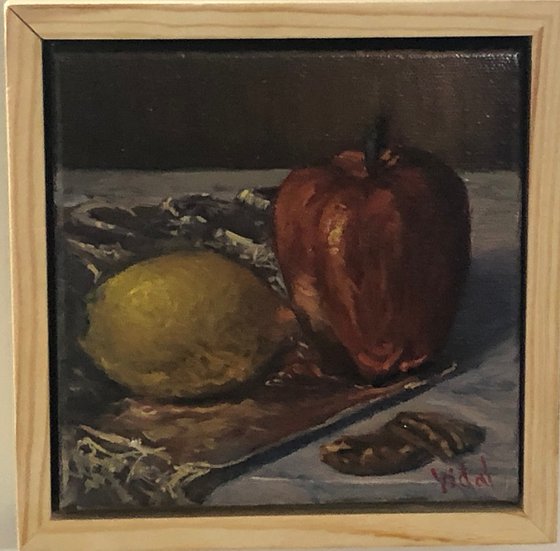 Apple, lemon and pecans - still life