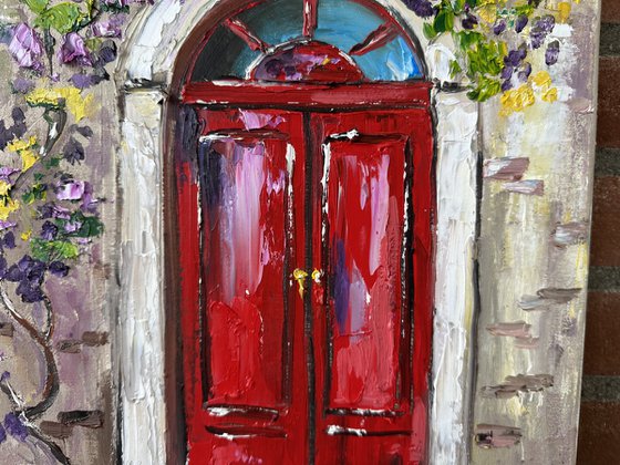 Red door with flowers