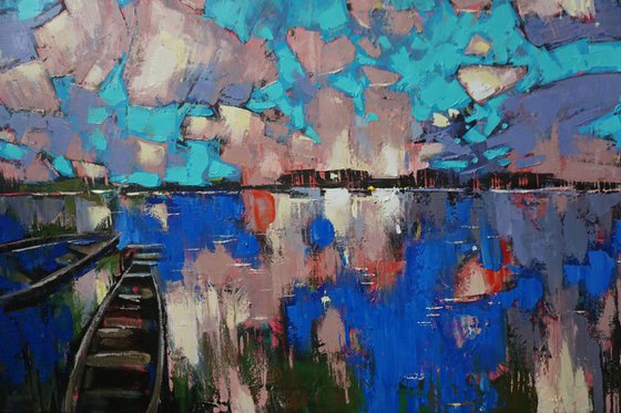 Mirror of water, boats in the clouds