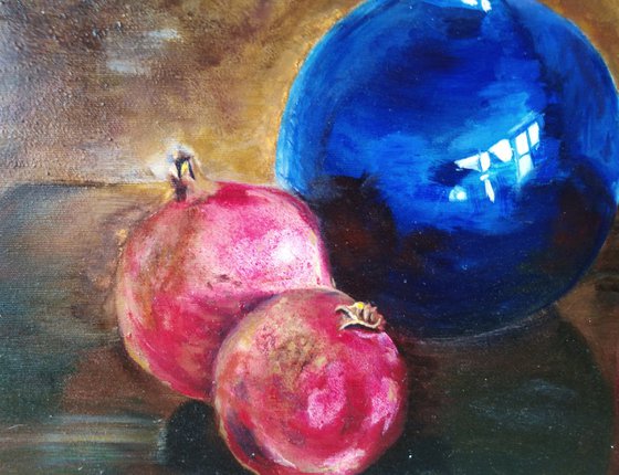 Still life with pomegranates and blue vase