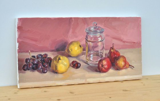 Quinces, grapes, pears and an old glass jar