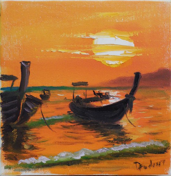 Sea sunset in Thailand and fishing boats