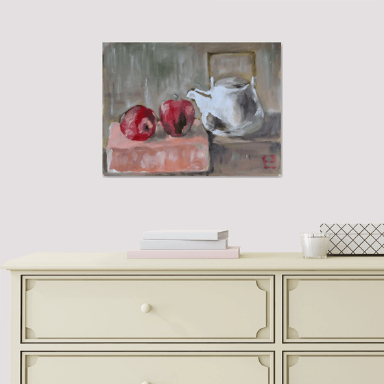 Red apples and teapot