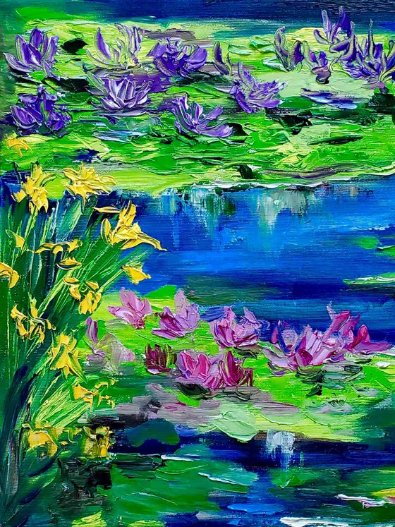 Giverny, garden of Claude  Monet in summer bloom,  water lilies, irises