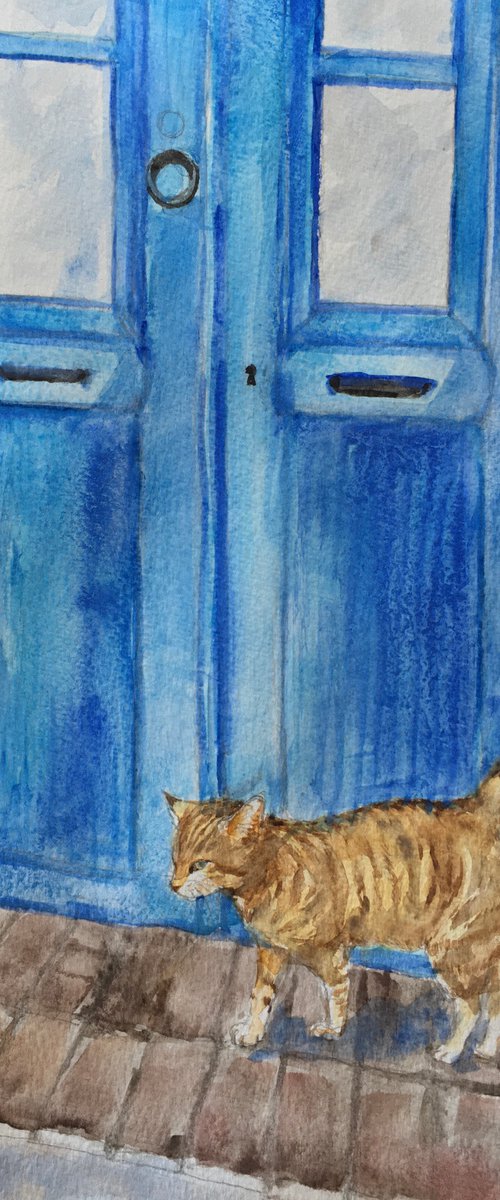 Cat and a blue door by Yumi Kudo