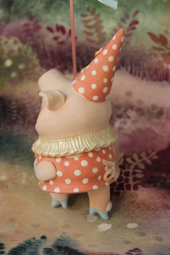 Little piggy in harlequin dress. Hanging sculpture, bell doll by Elya Yalonetski