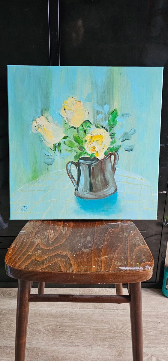 Blooming yellow roses on blue