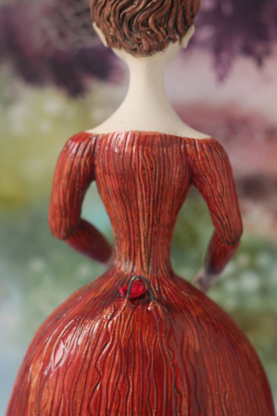 Beautiful Dame with Twirled Updo in Red Dress.  Wall sculpture by Elya Yalonetski