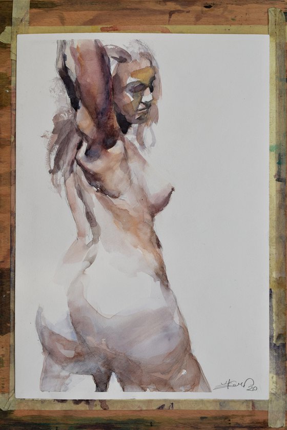 Nude with raised hand