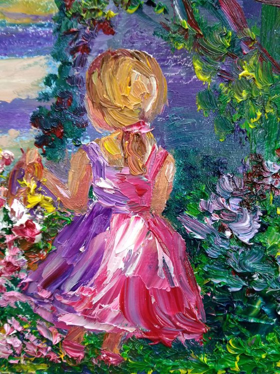 Girl picking flowers in the garden