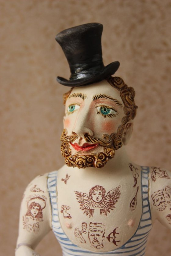 Circus athlete with hipster beard. Wall sculpture by Elya Yalonetski.