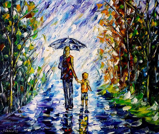 Woman with child in the rain