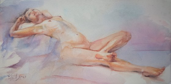 Beautiful naked woman lying down