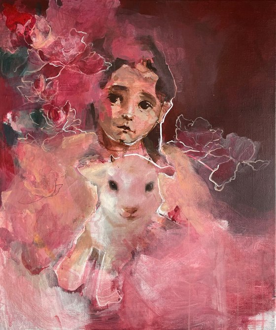 “With the baby goat”