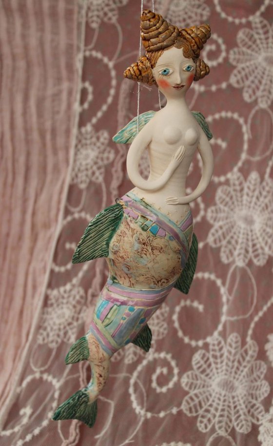 Mermaid, hanging sculpture.