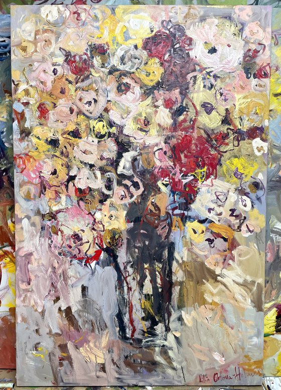 Vase of flowers.