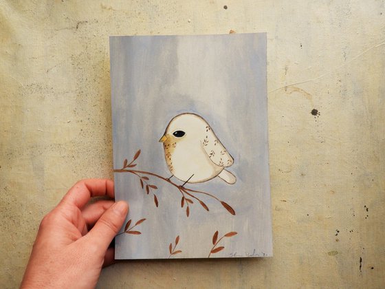 The small bird in white