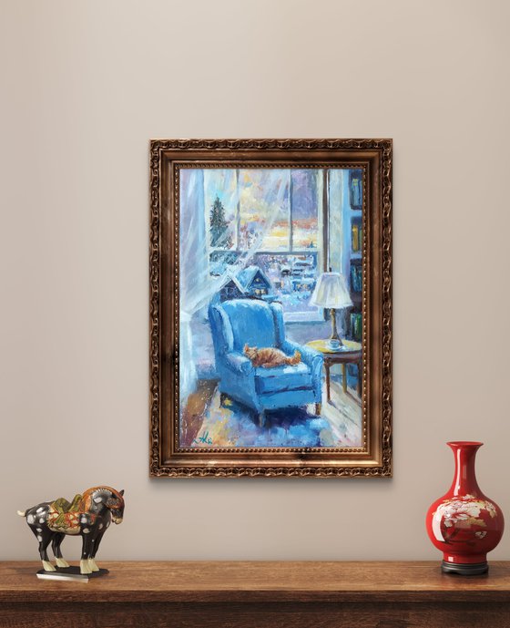 Ginger cat and armchair