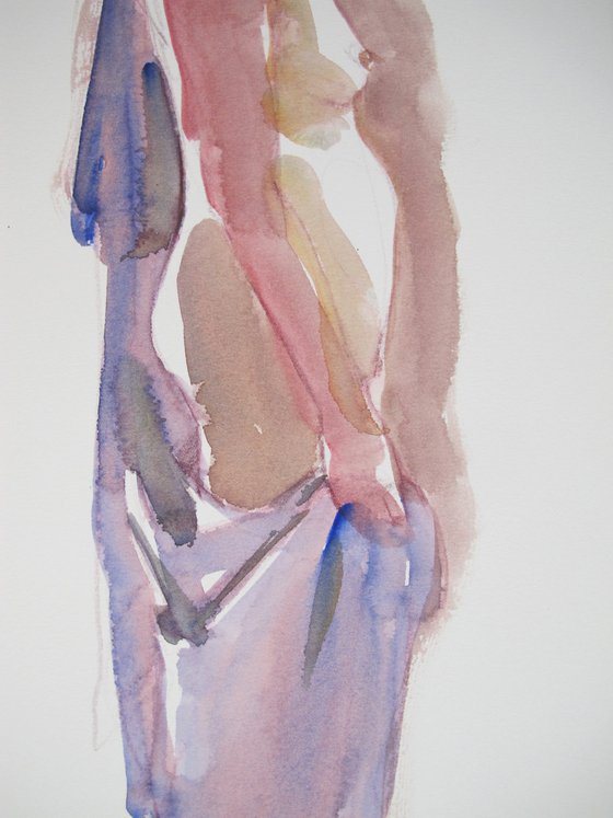 Standing female nude draped