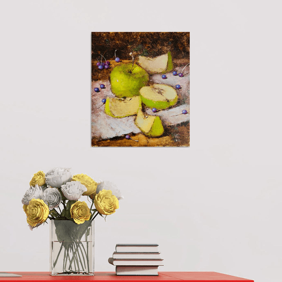 Green apples on dark