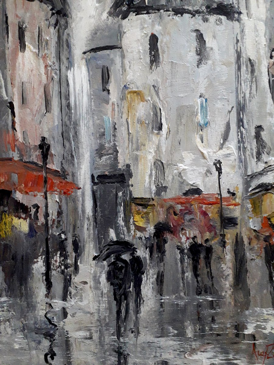 A couple under an umbrella. ?ityscape. Rainy city by Alexander Zhilyaev