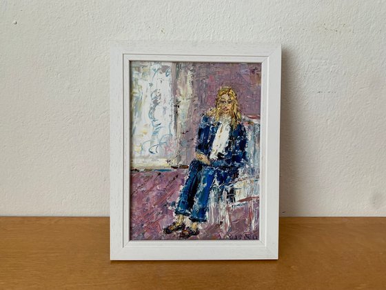 Portrait of a seated young woman