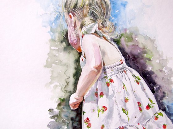 Little girl picking flowers