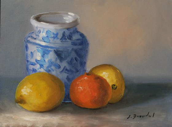 Blue vase with fruits