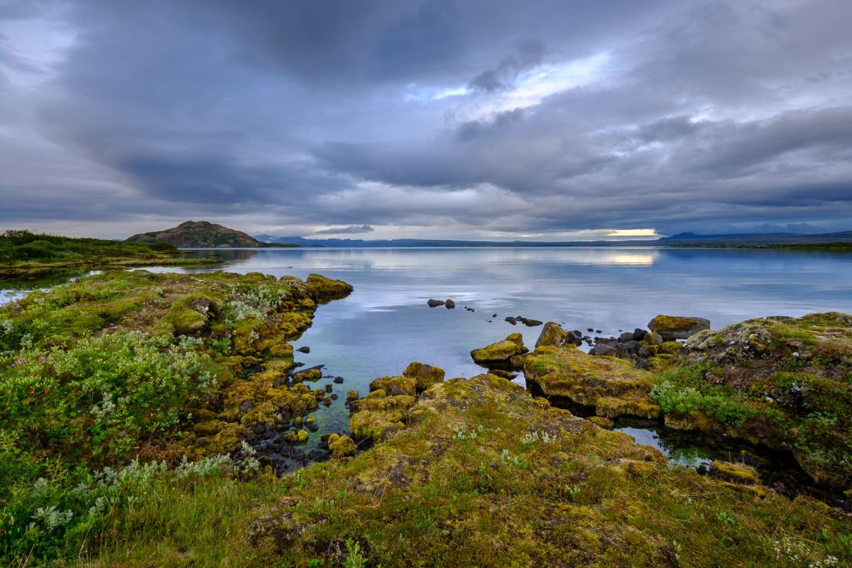 View across tranquil lake, ingvallavatn, Iceland by Baxter Bradford