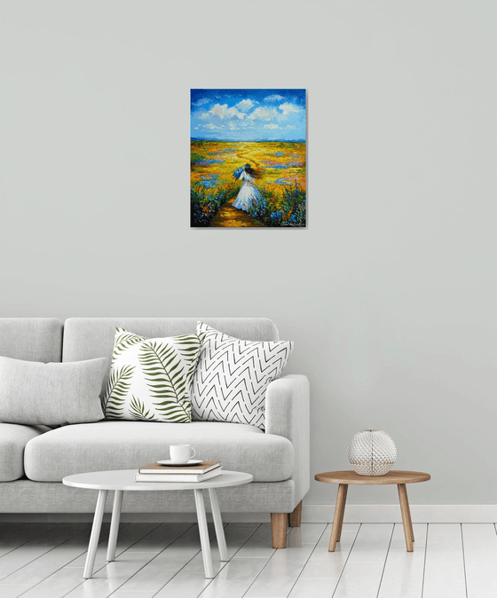 Woman Walking Through a Flower Field