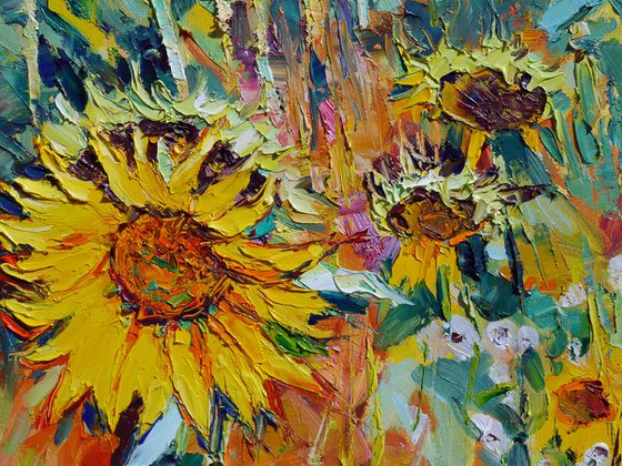 By a sunflowers field