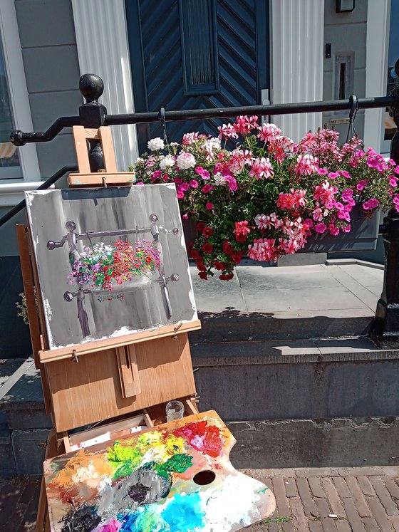 The flowers in the pot by the entrance. Plein air painting