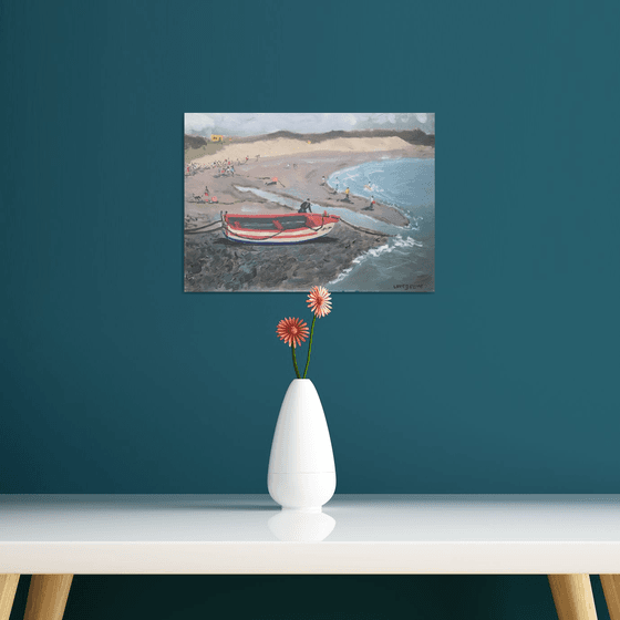 Red boat on the beach