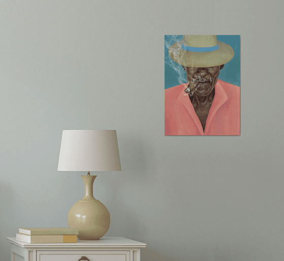 Smoking man in a hat