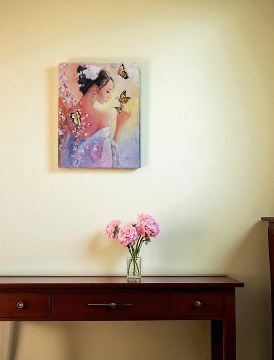 Portrait of a woman playing with Butterflies