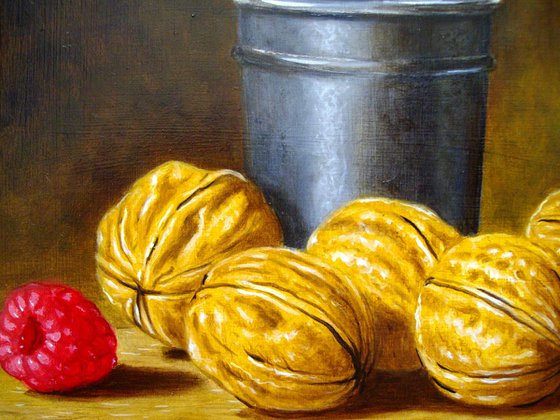 Nuts with a pewter cup