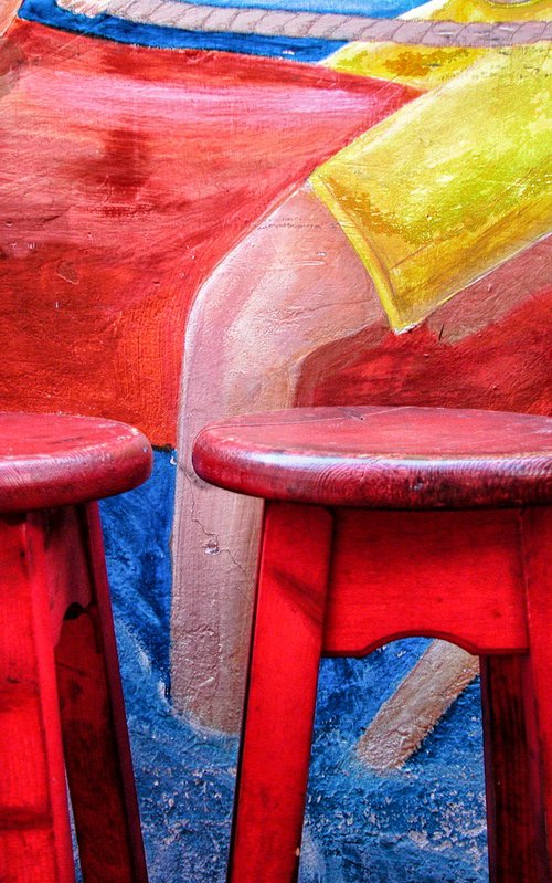 red seats by Abba Richman