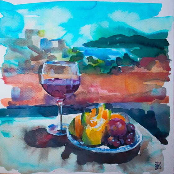 Wine and fruits near the sea