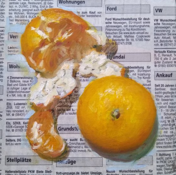 Tangerines on the newspaper