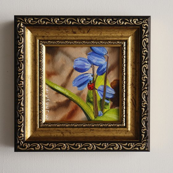 Blue Spring Flowers with Ladybug
