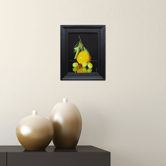 Orange with three grapes