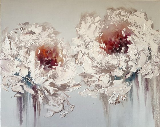 Two large white flowers on white