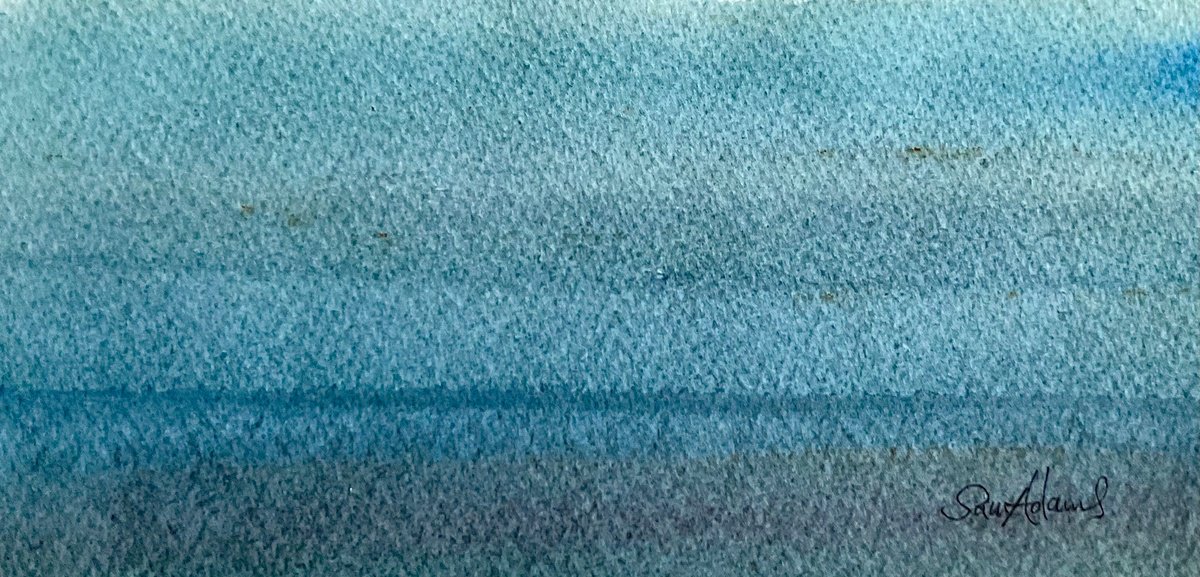 Muted blue light over the sea by Samantha Adams