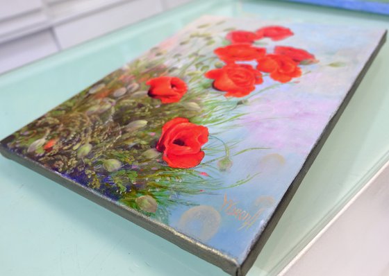 Poppies with wild flowers.