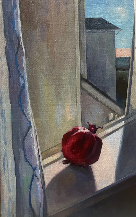 View.  Pomegranate on an open window.
